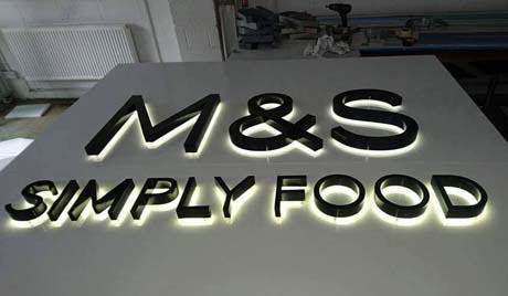 M & S wet sprayed sign